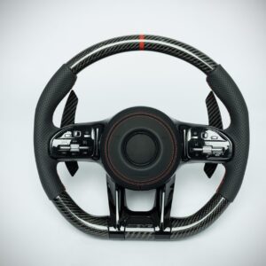 Mercedes Benz carbon fiber steering wheel with red marker and red stiching on perforated leather grip