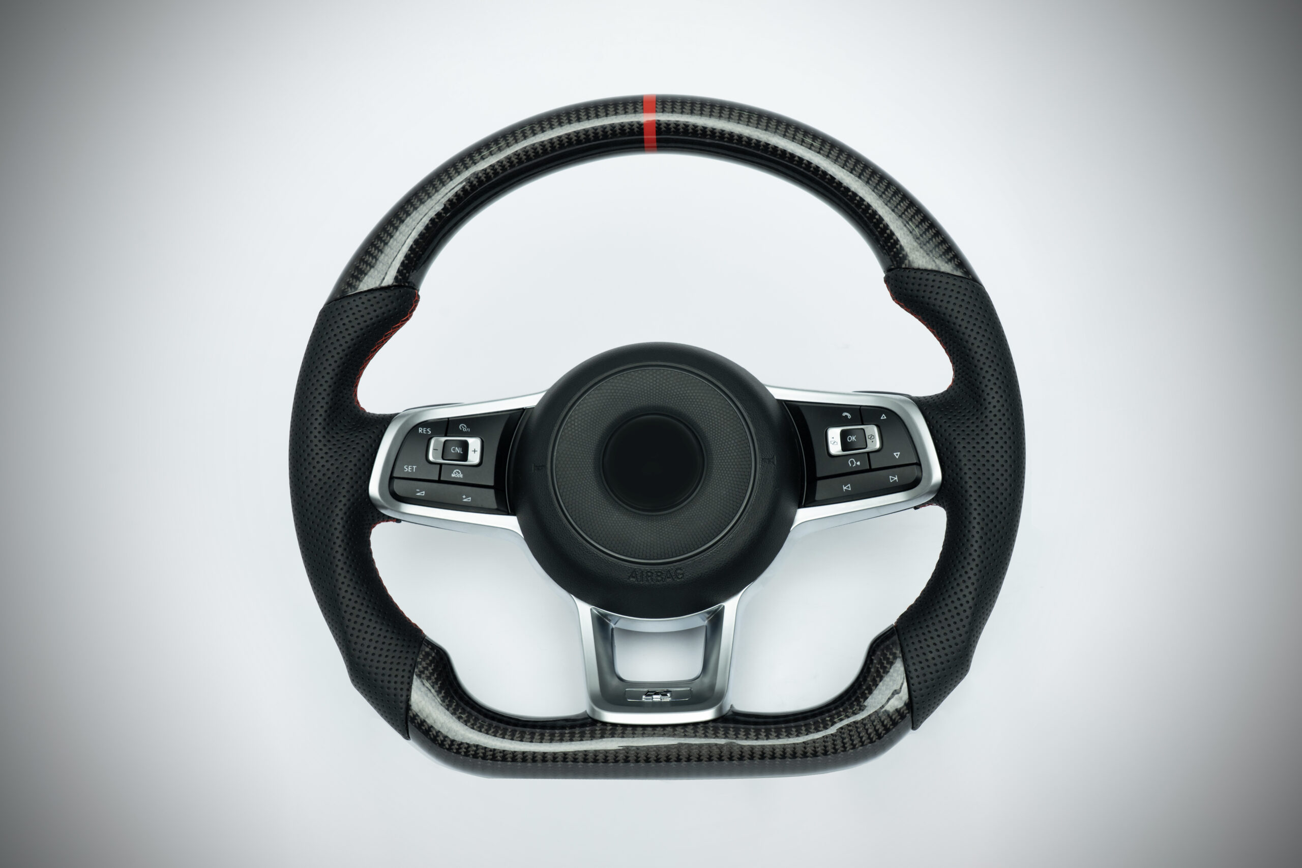 Volkswagen Golf Carbon fiber steering wheel with red marker, red stiching on perforated leather grip