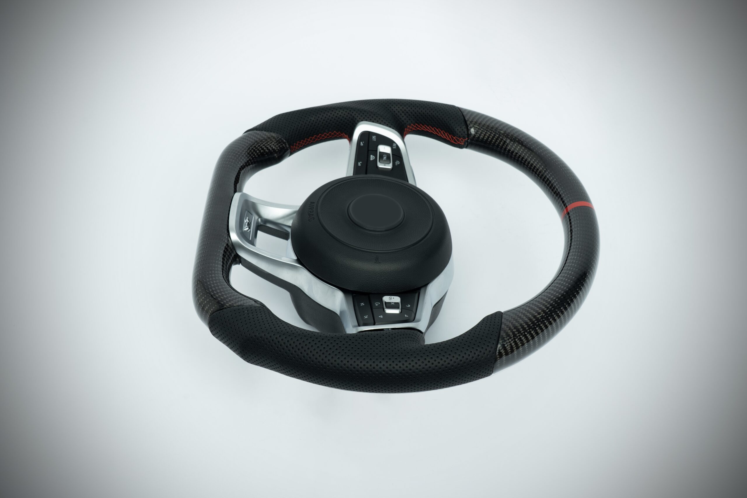 Volkswagen Golf Carbon fiber steering wheel with red marker, red stiching on perforated leather grip - Image 2