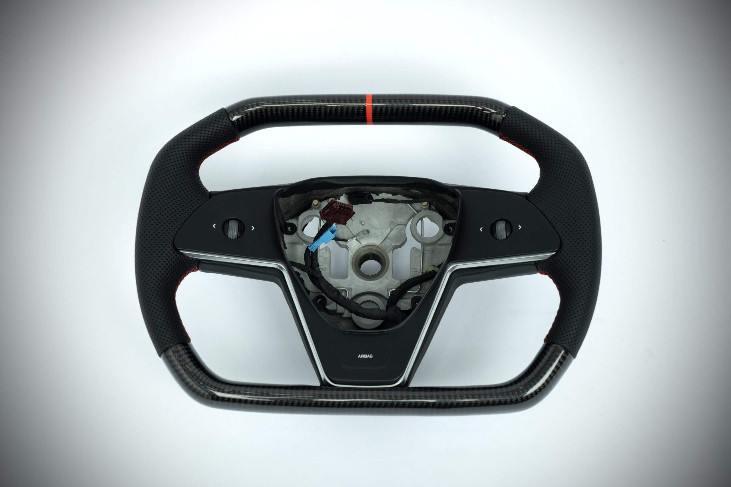 Tesla Model 3/Y carbon fiber cybertruck style steering wheel with red marker, red stiching on perforated leather