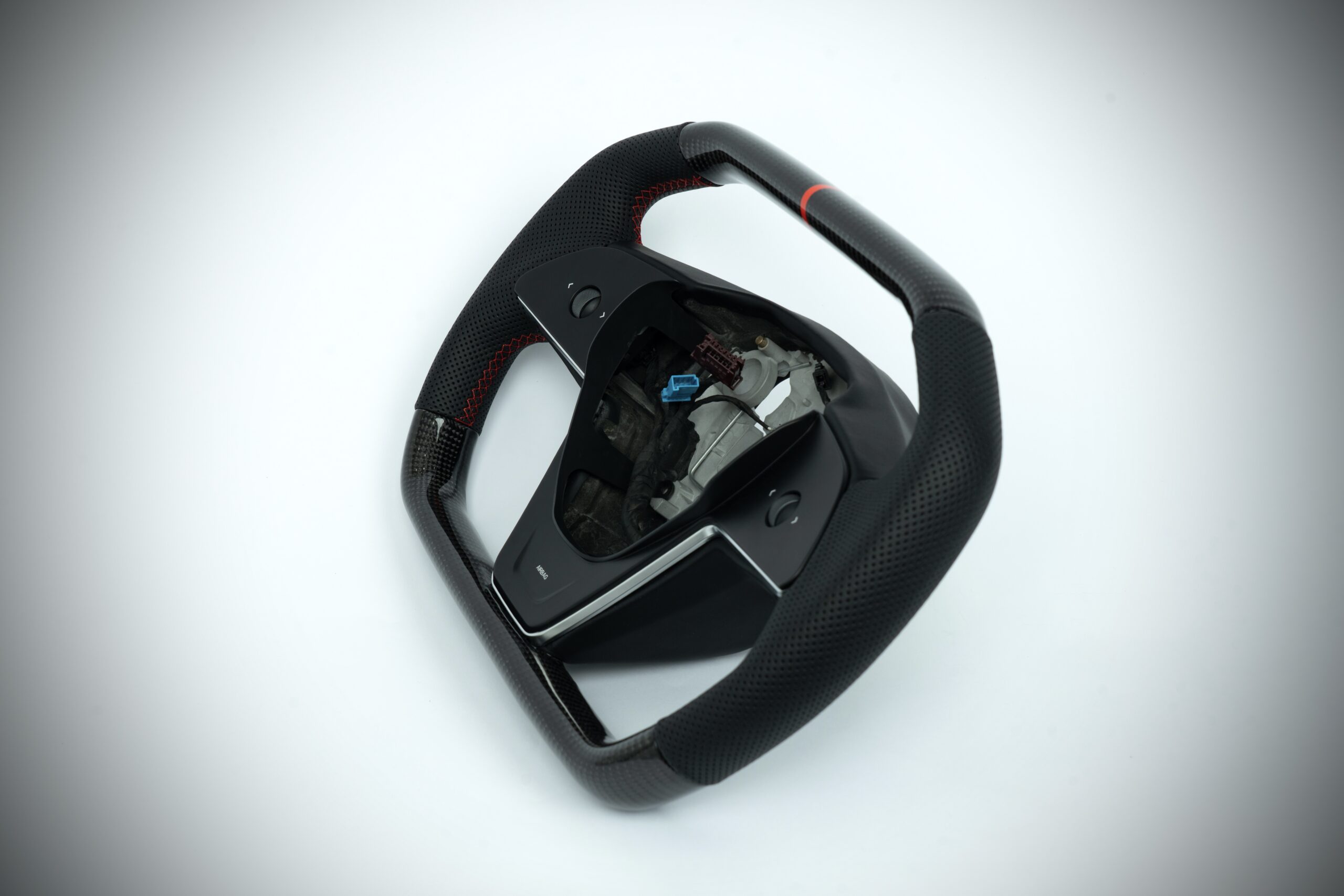 Tesla Model 3/Y carbon fiber cybertruck style steering wheel with red marker, red stiching on perforated leather - Image 3