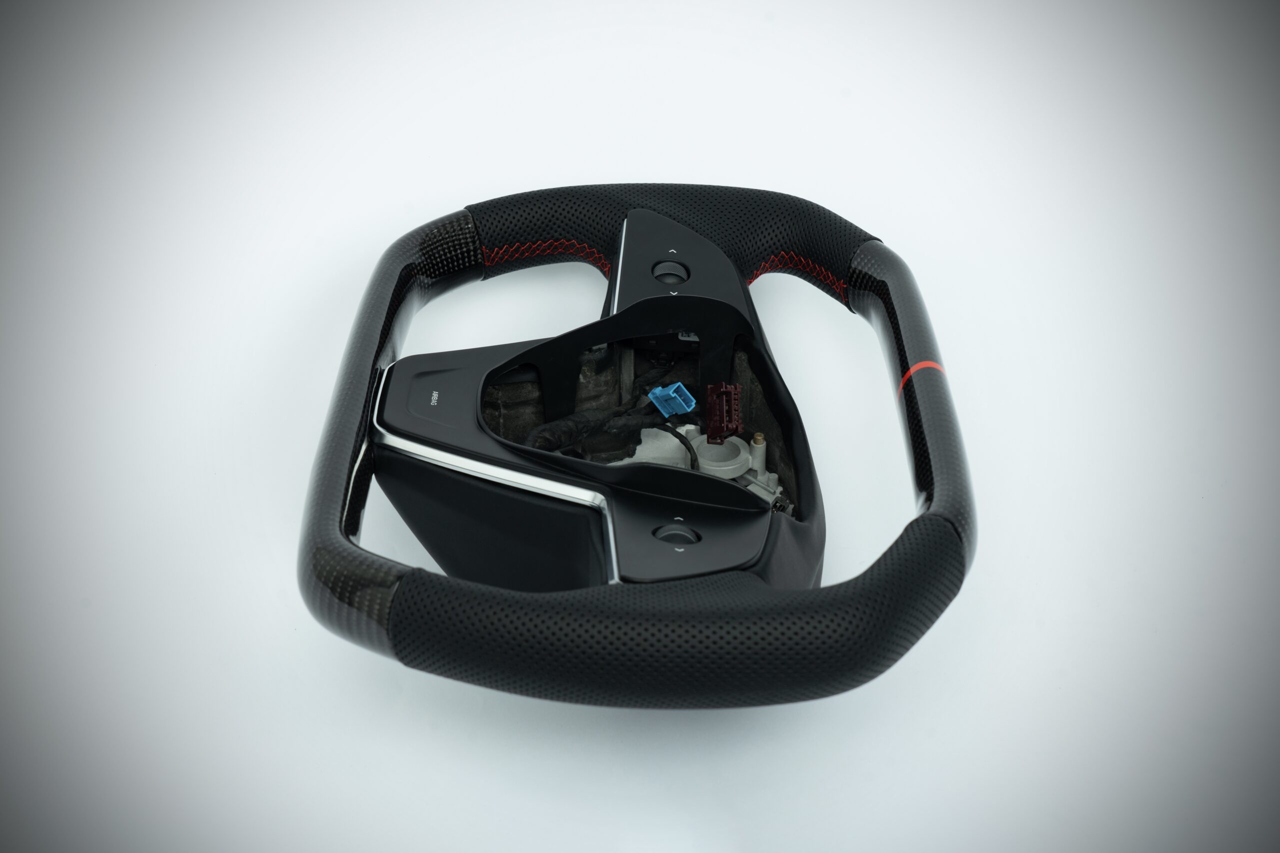 Tesla Model 3/Y carbon fiber cybertruck style steering wheel with red marker, red stiching on perforated leather - Image 4