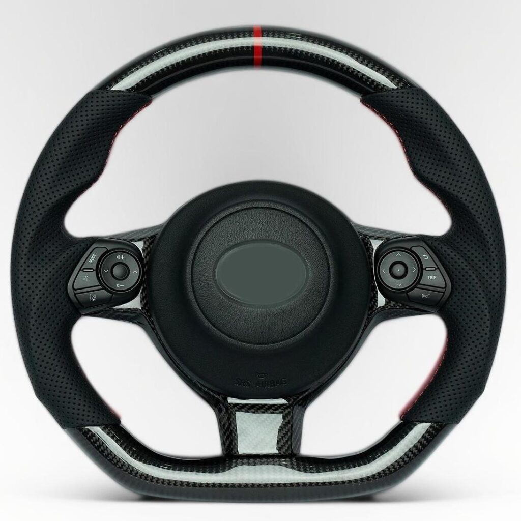 GR86/BRZ carbon fiber steering wheel with perforated leather grip