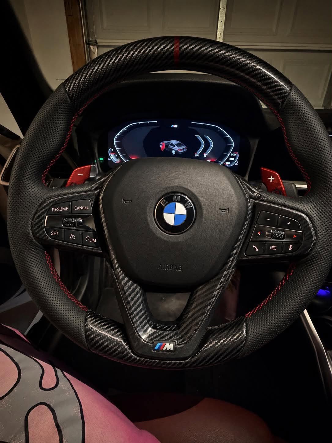 Deposite:300$, total price 600$,Model: 2022 BMW 330i non M Sport steering wheel Requirements: Carbon fiber upper and lower sections, red stitching, red centering marker, perforated leather grips (original factory design), carbon fiber trim and button bezels, red paddle shifters, with buttons, no heating or vibration.m logo at the bottoms