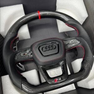 2021 Audi Rs5 , Full carbon fiber, Heated, vibrate, perforated sport leather grip,red stitching,red center strip, RS logo at the bottom.